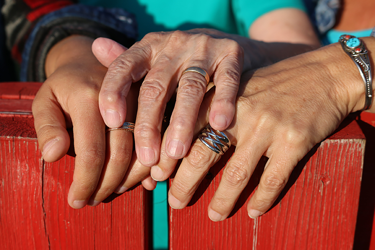 The,Overlapping,Hands,Of,Three,Generations,Of,Caucasian,Women.